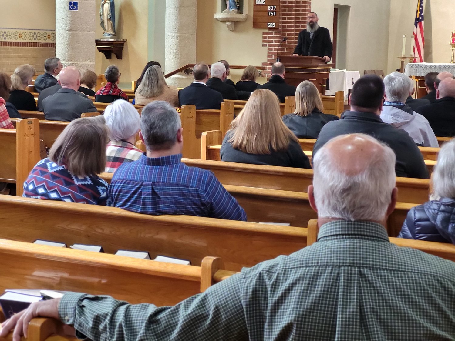 Rami Salfiti, a lifetime resident of the Old City portion of Jerusalem, speaks to members of the Equestrian Order of the Holy Sepulchre of Jerusalem about the situation facing Christians in the Holy Land, on Feb. 5 in St. Stanislaus Church in Wardsville.